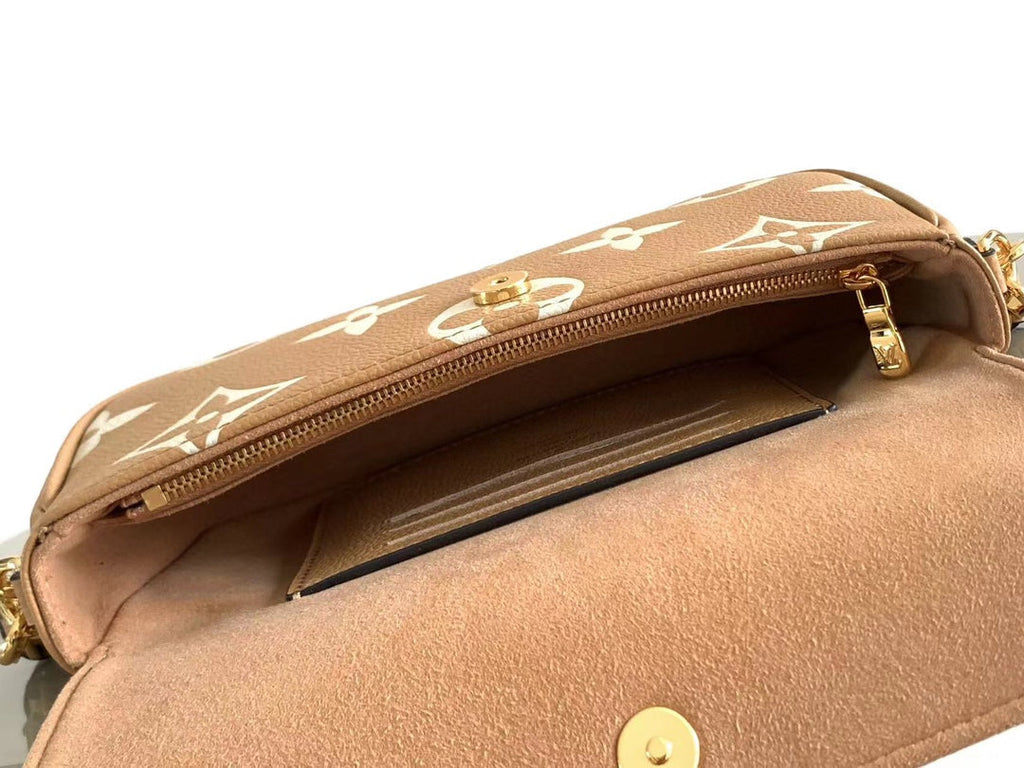 Louis Vuitton Ivy 23 in Arizona Cream Monogram Empreinte Leather Gold Hardware Bag