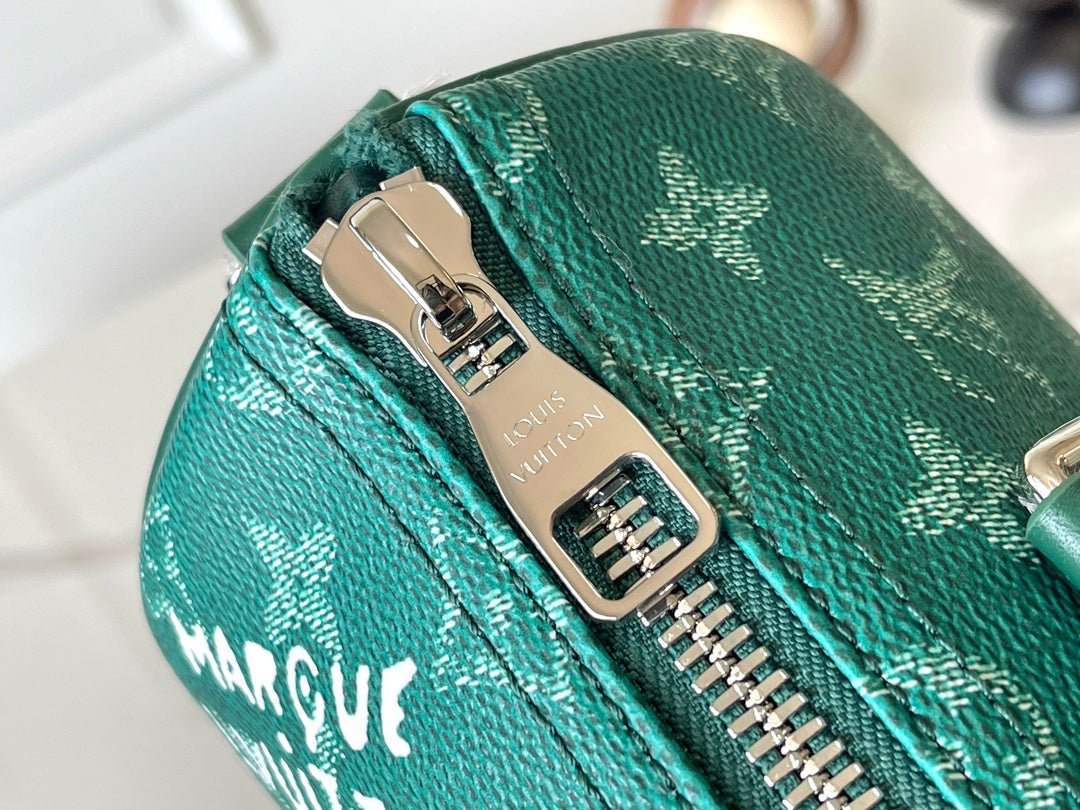 Louis Vuitton Keepall Bandoulière 25 in Green Monogram Heritage Canvas Bag